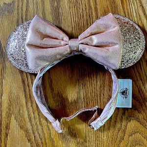 Rose colored, Glitter Minnie headband. Adjustable. Never worn.